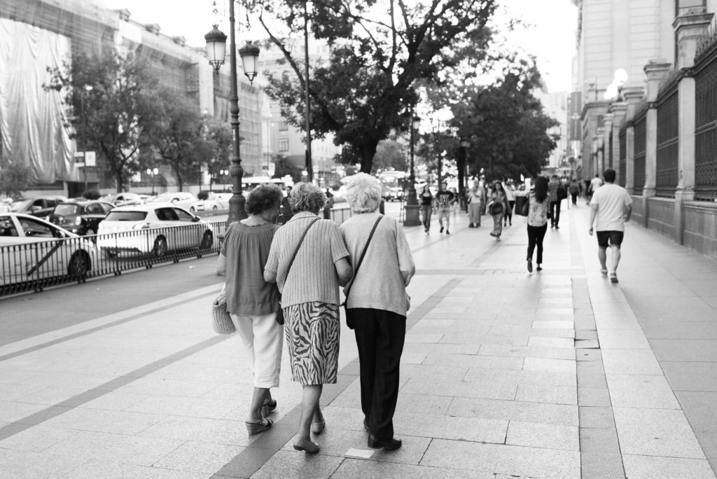 three old women walking together