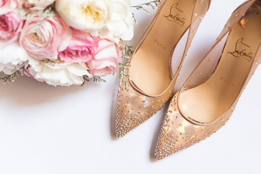 wedding day shoes and pink peony flower bouquet