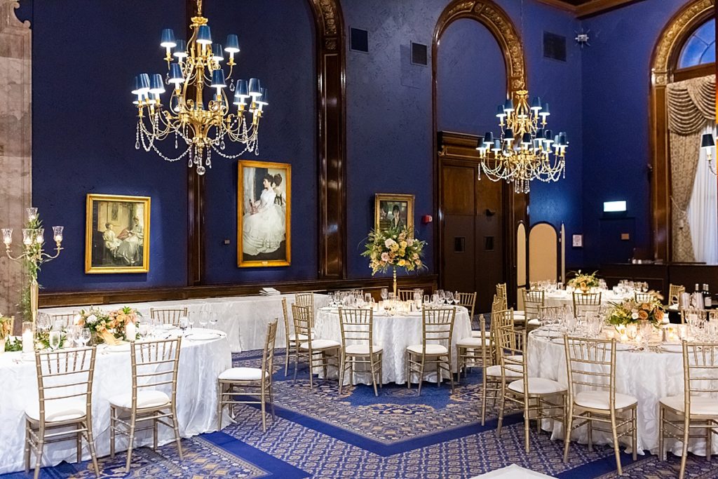 navy walls and blue carpet white tablecloth