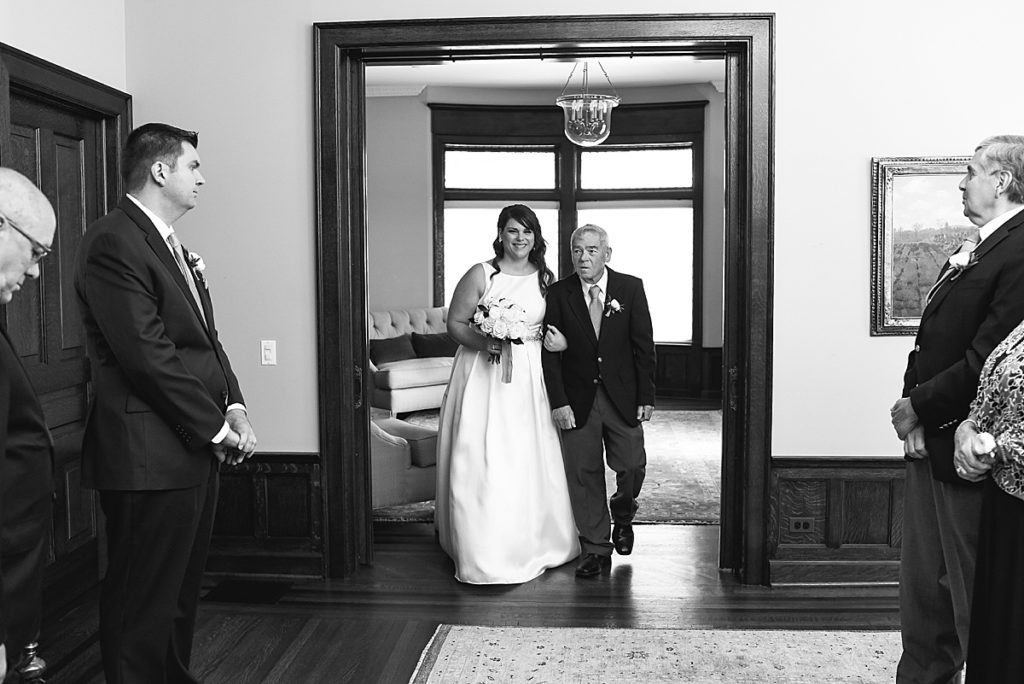 Bride begins to walk into the ceremony space