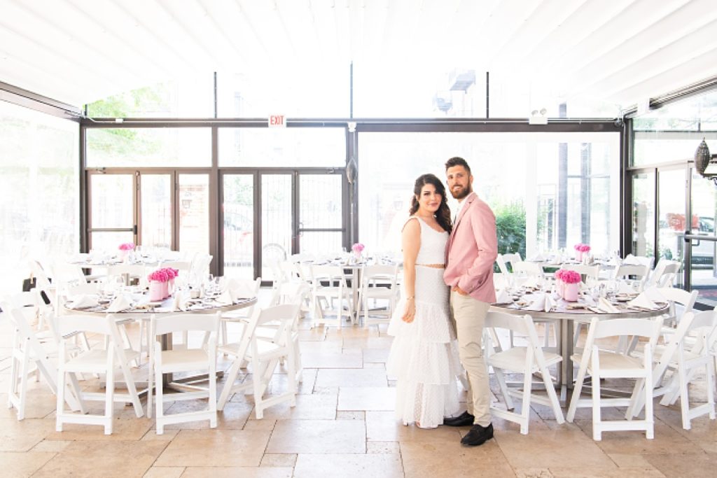 Beautiful and airy venue space with bride & groom