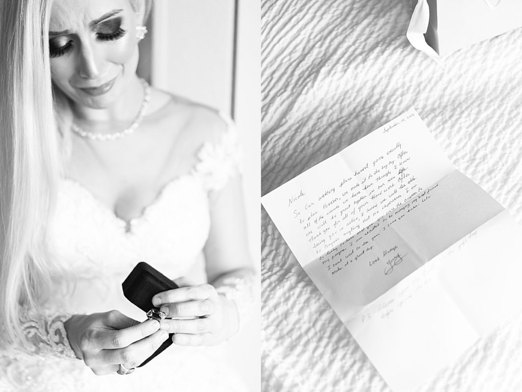 Bride is photographed opening the lady bug gift