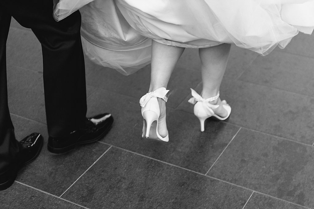 All white shoes with dainty little bows
