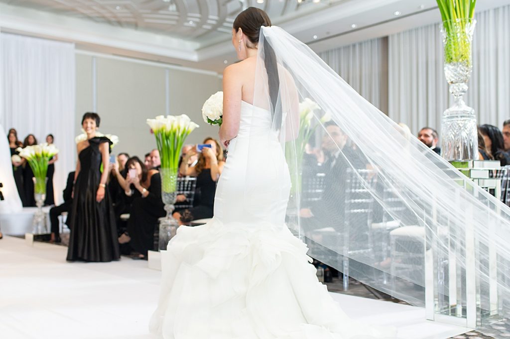 Bride walks the aisle in London House's ballroom