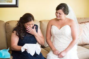 bride gives gift to mother
