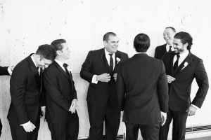 candid funny groomsmen