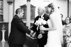 father gives away bride