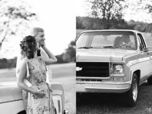 Couple posing near vintage Chevy truck in large field (black and white photo)
