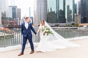 Photo of bride and groom in downtown Chicago with the Chicago skyline