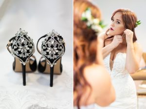 Bride getting ready for wedding day by putting on earrings and shoes
