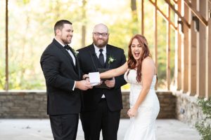 Fun moment during the outdoor wedding ceremony at Memphis Botanical Gardens
