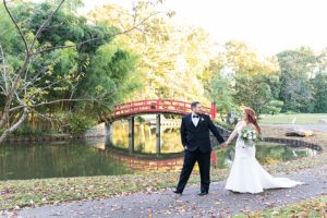 The bride and groom posed in the Japanese garden at the Memphis Botanical Gardens