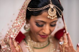 the bride posed for portraits in a traditional lehenga