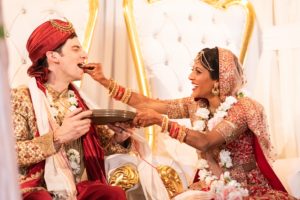 photo of bride and groom during traditional Indian wedding ceremony