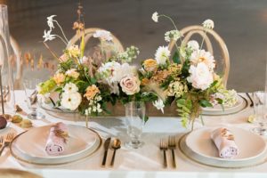 wedding flowers on dinner table at wedding reception