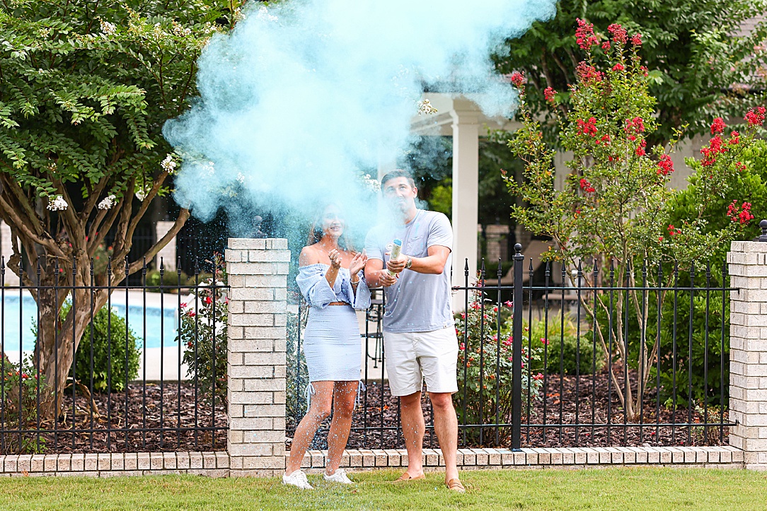 Smoke bomb at baby gender reveal party.