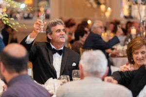 The father of the bride gave a toast at the wedding reception