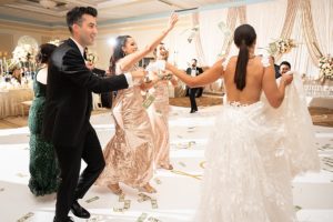 the bride and groom did a Greek wedding dance